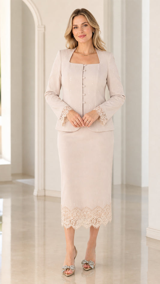 Front full view of women's champagne two-piece skirt suit with lace trim