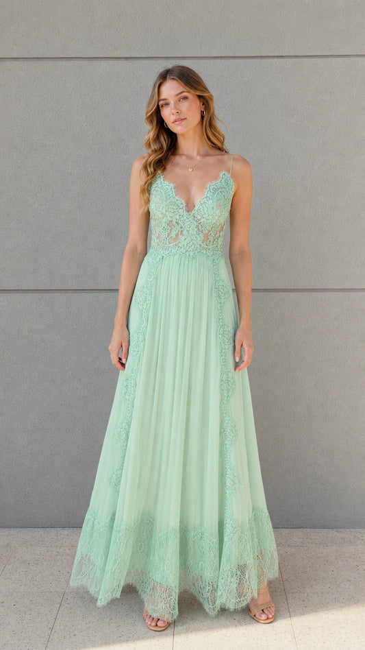 Front full view of woman wearing mint green floral lace pleated maxi dress