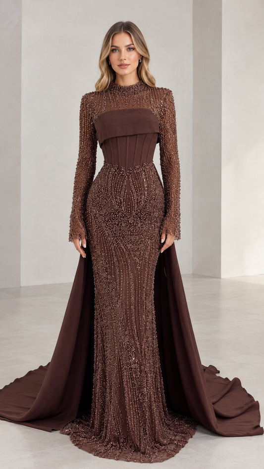 Front view of woman wearing brown beaded high neck evening gown with corset bodice and train
