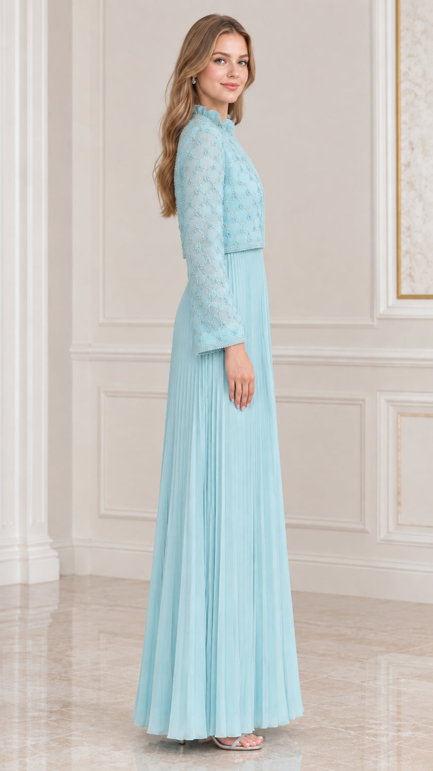 Side profile view of sky blue pleated formal gown and long sleeve embroidered jacket