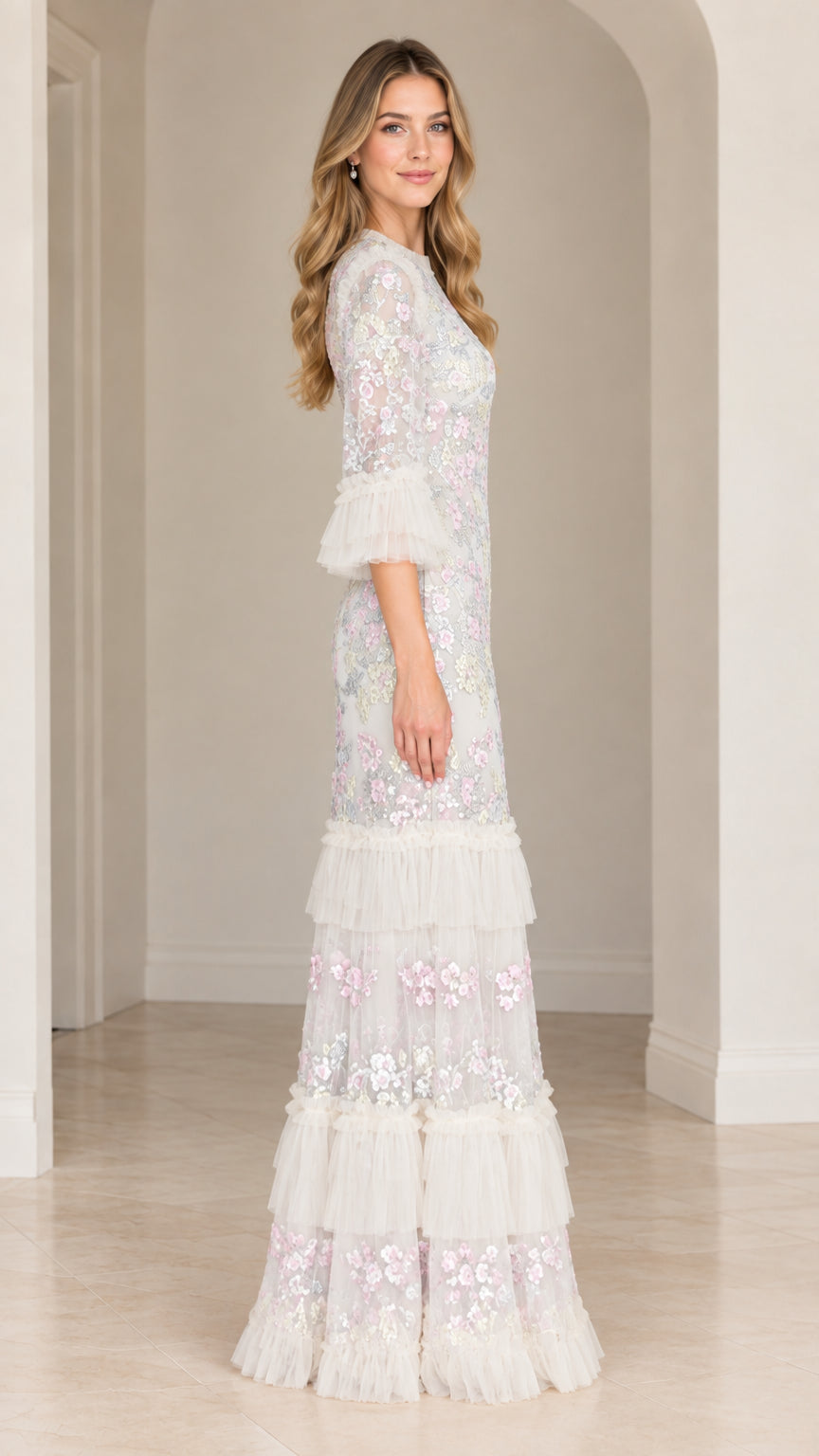 Side profile view of Ivory White tiered sequin embroidered evening dress
