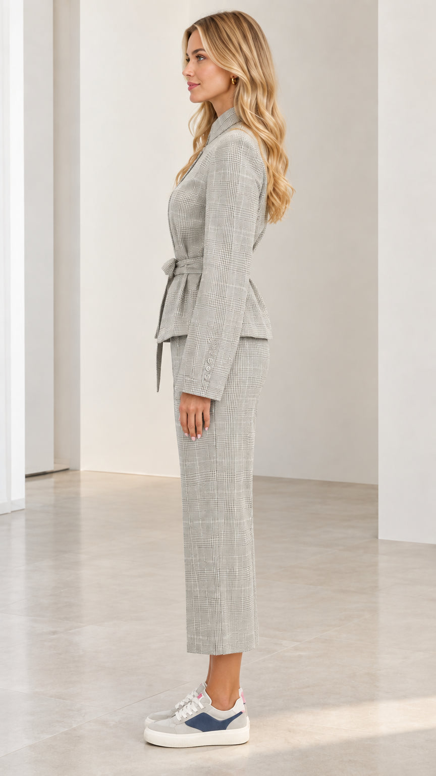 Side profile view of Light Grey plaid belted blazer and cropped pants set