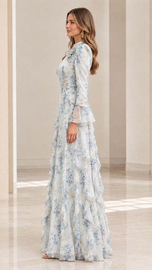 Side profile view of dusty blue floral long sleeve ruffle evening gown