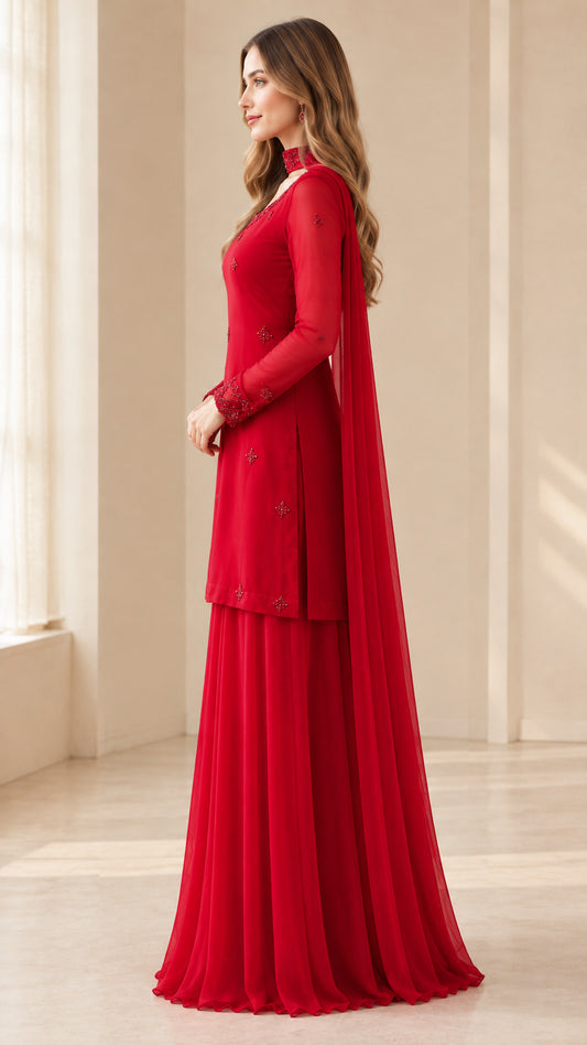 Side profile of woman wearing red georgette kurti and wide-leg sharara pants