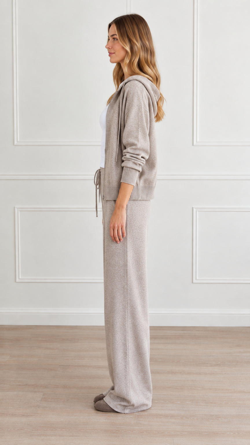 Side profile view of model wearing heather taupe knit loungewear set