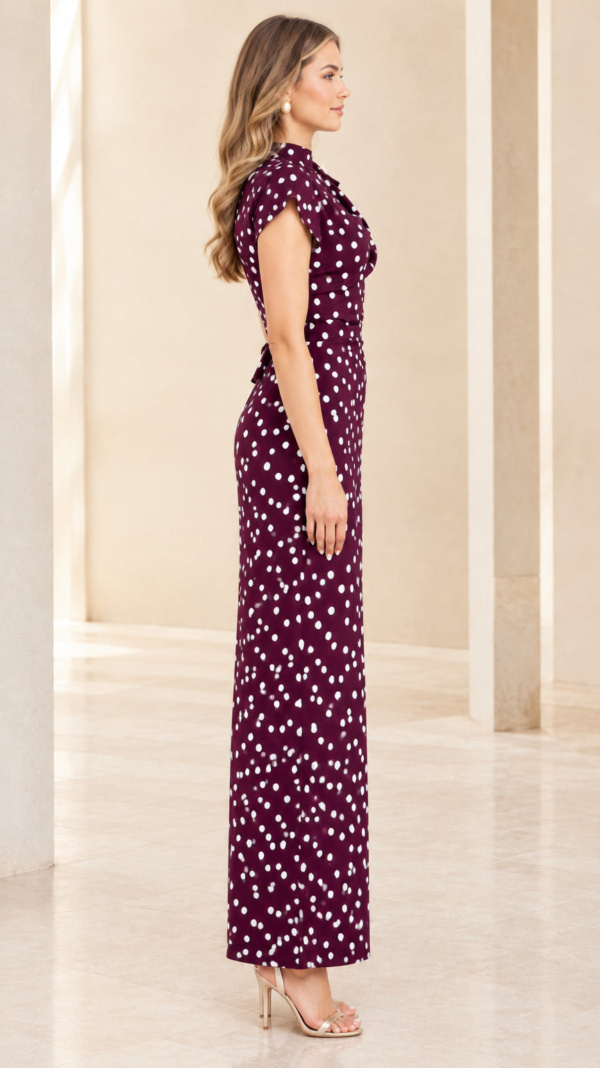 Side profile of Burgundy polka dot column maxi dress showcasing slim silhouette