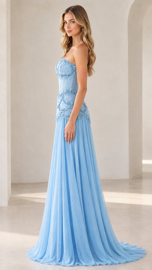Side profile of sky blue strapless pleated evening gown
