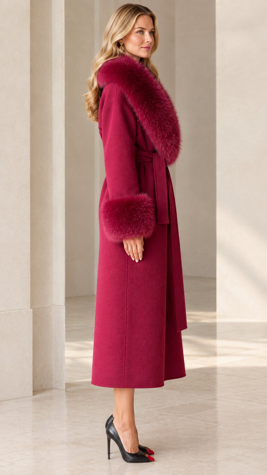 Side profile view of elegant wine red belted long coat with plush collar