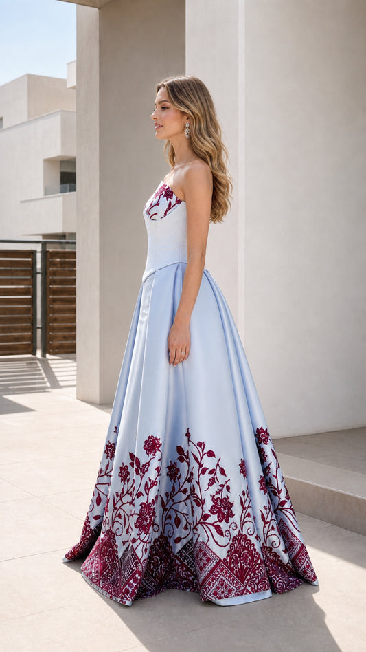 Powder blue floral evening gown shown from the side