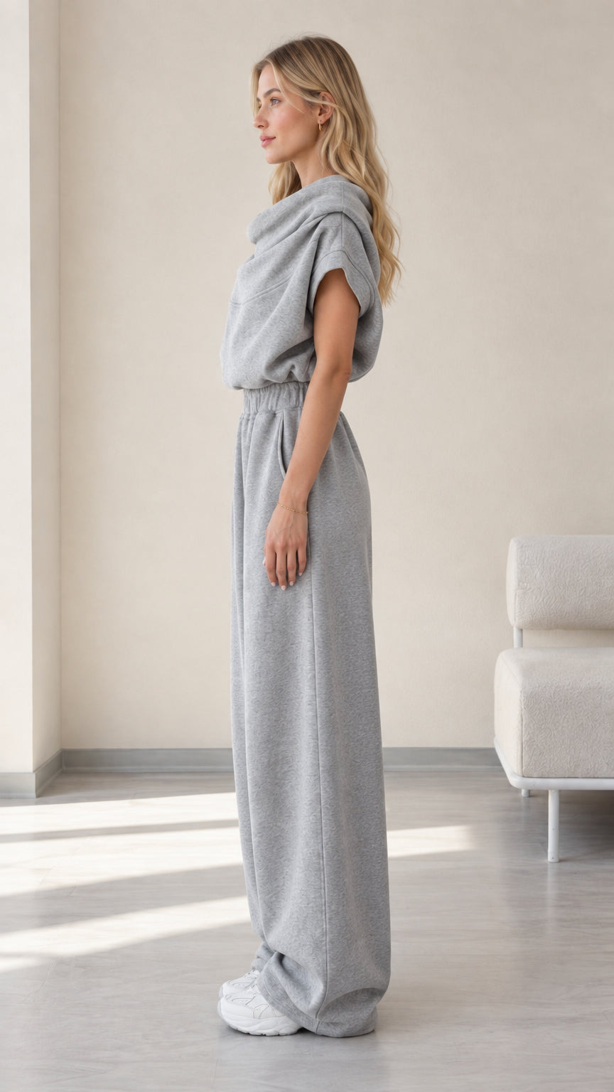 Side profile view of model wearing heather grey two-piece wide-leg loungewear set