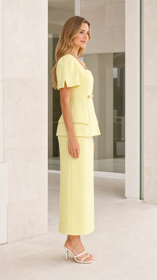 Side profile view of yellow skirt set