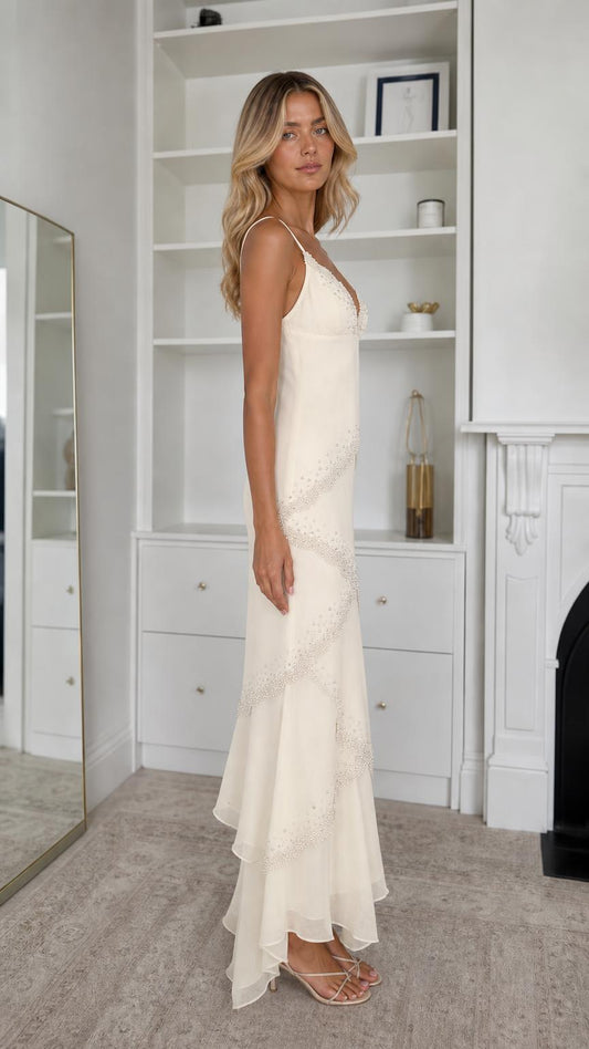 Side profile view of champagne maxi dress
