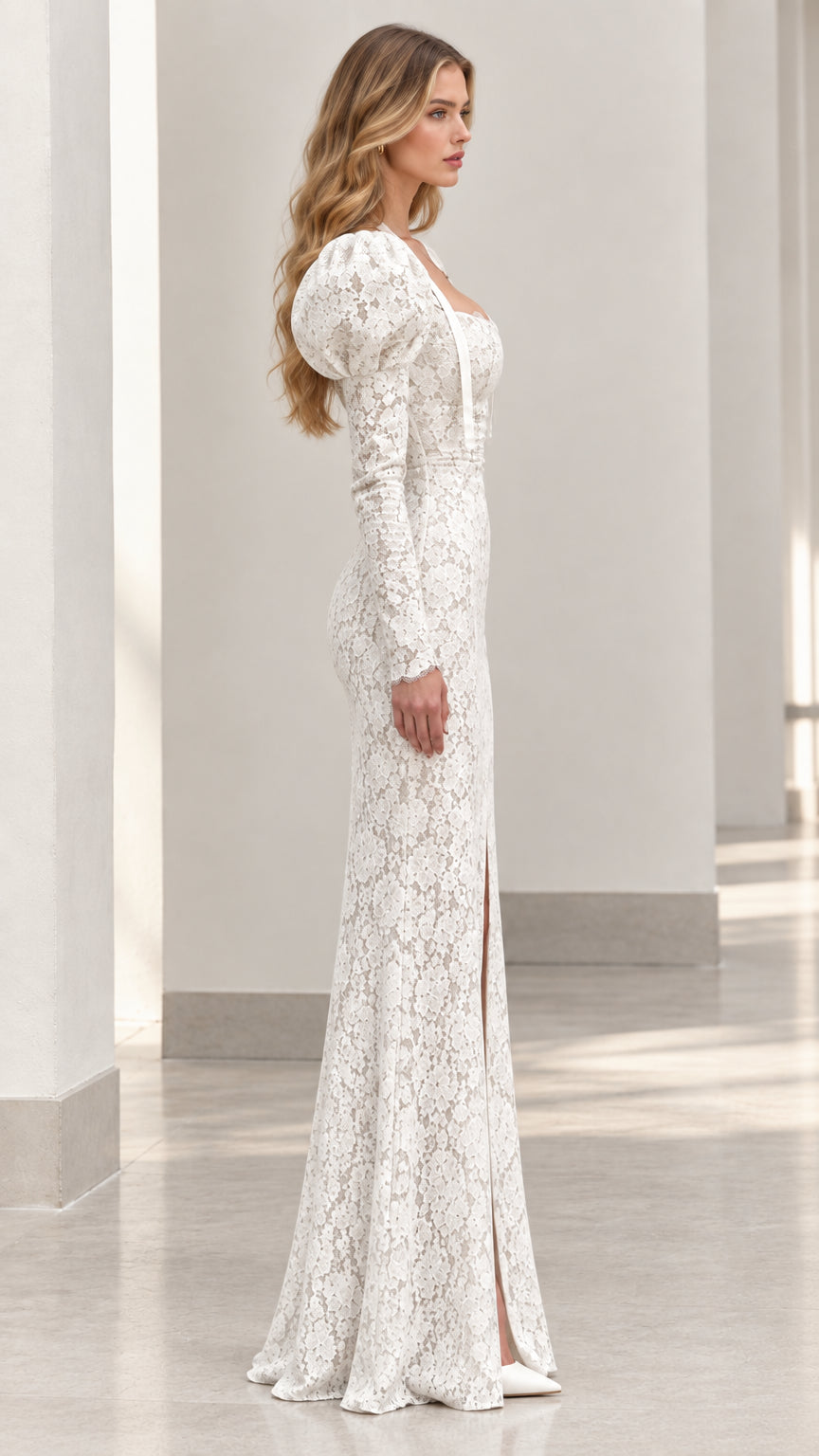 Side view of woman wearing white puff sleeve lace evening gown