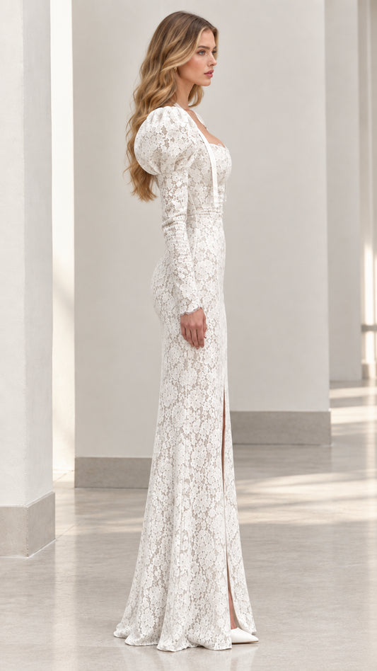 Side view of woman wearing white puff sleeve lace evening gown