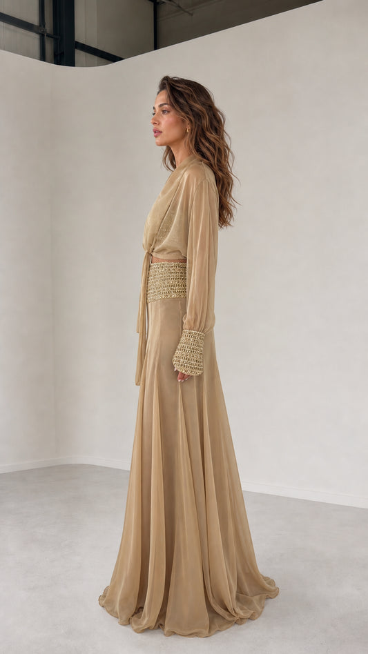 Side view of model wearing champagne three-piece chiffon set