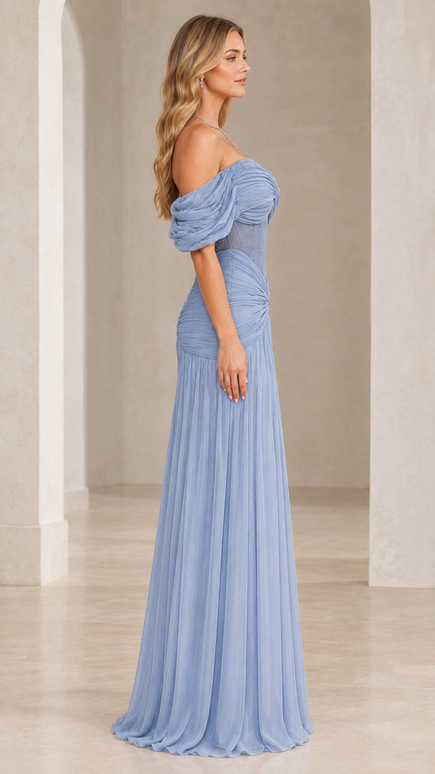 Side profile view of woman modeling Dusty Blue draped chiffon formal dress