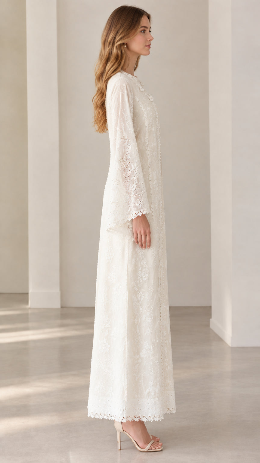 Side view of cream embroidered lace floor-length modest gown