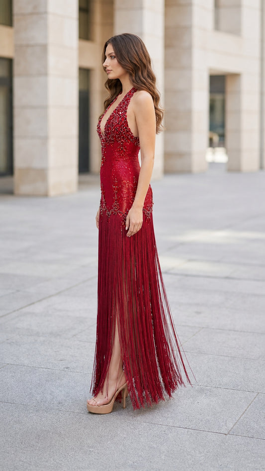 Side profile of model in Red sequin fringe maxi dress