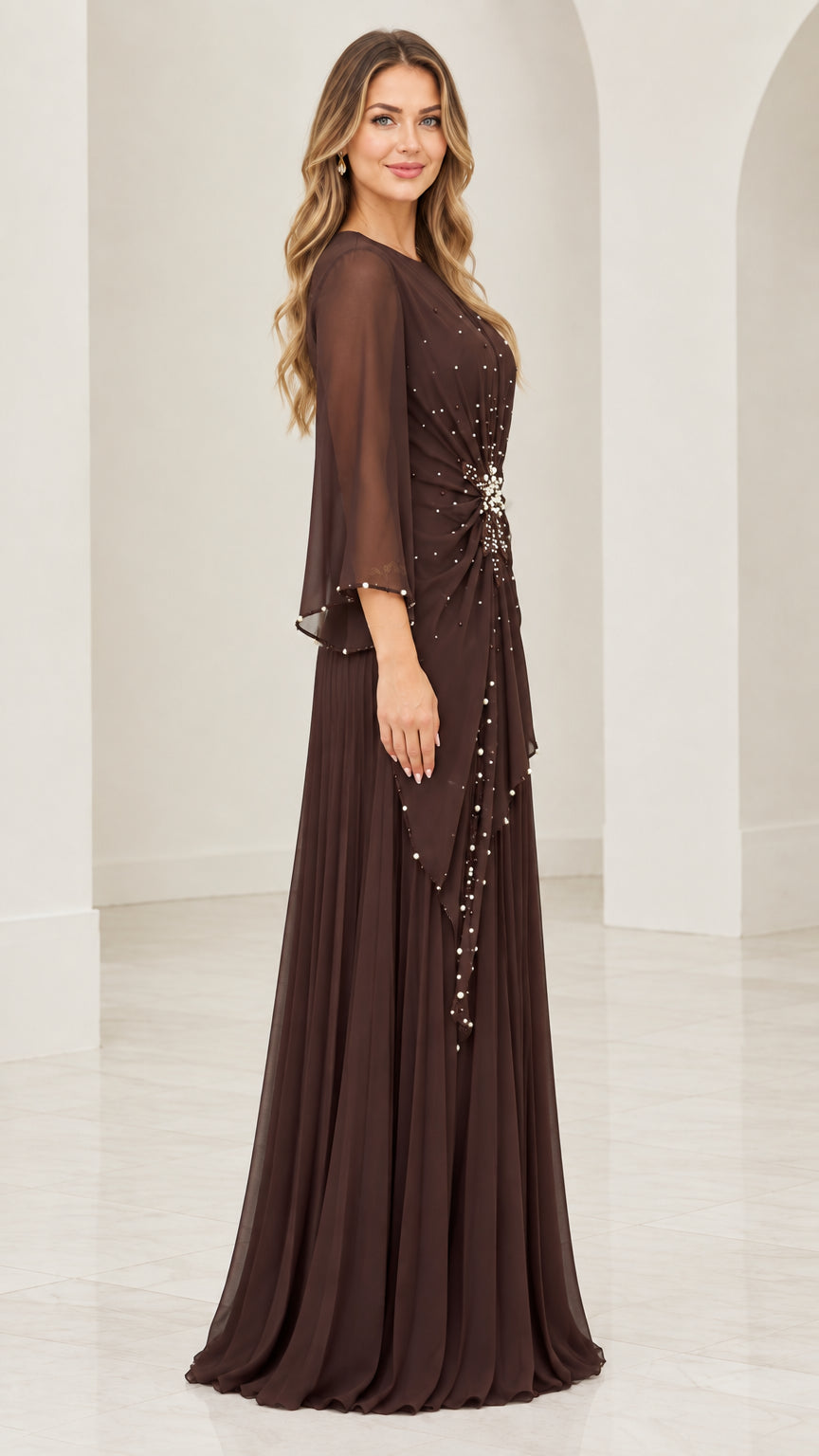 Side profile of woman in dark brown flowing chiffon formal gown with flutter sleeves