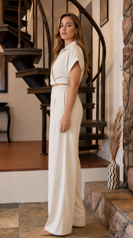 Side profile of woman in beige matching pants set