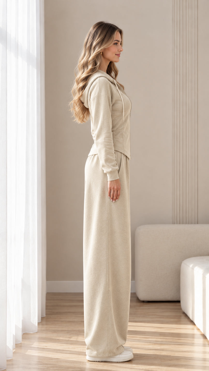 Side view of beige 2-piece tracksuit set showing wide leg silhouette