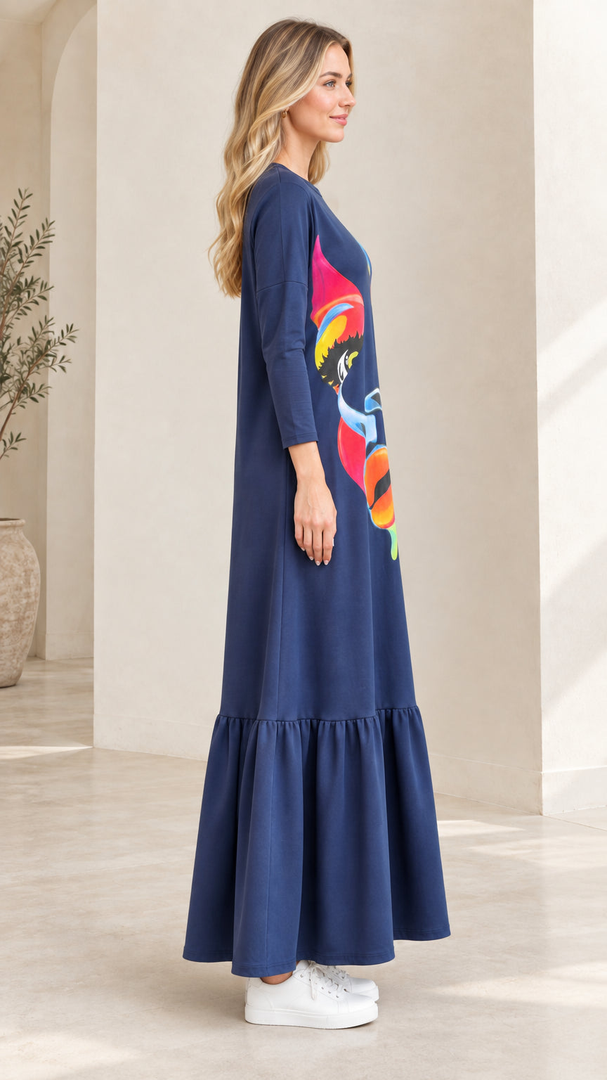 Side view of Navy Blue artistic print long-sleeve tiered maxi dress