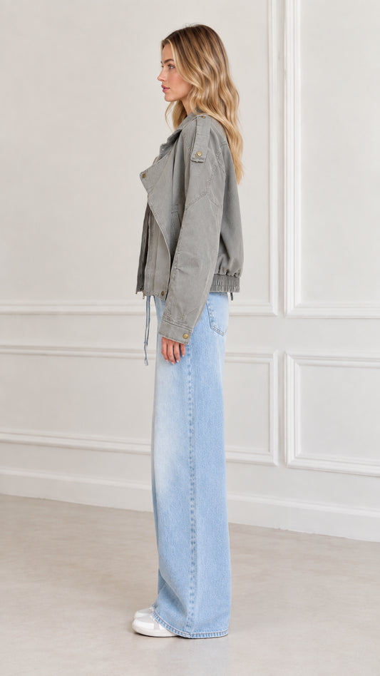 Side profile of model in Sage Green relaxed twill moto jacket