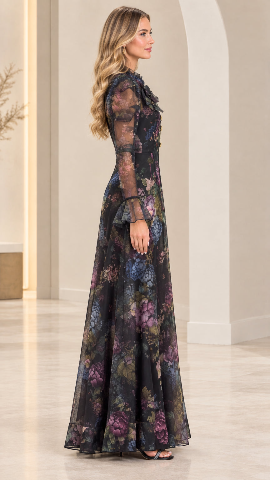 Side view of black floral print sheer long sleeve maxi dress showing silhouette