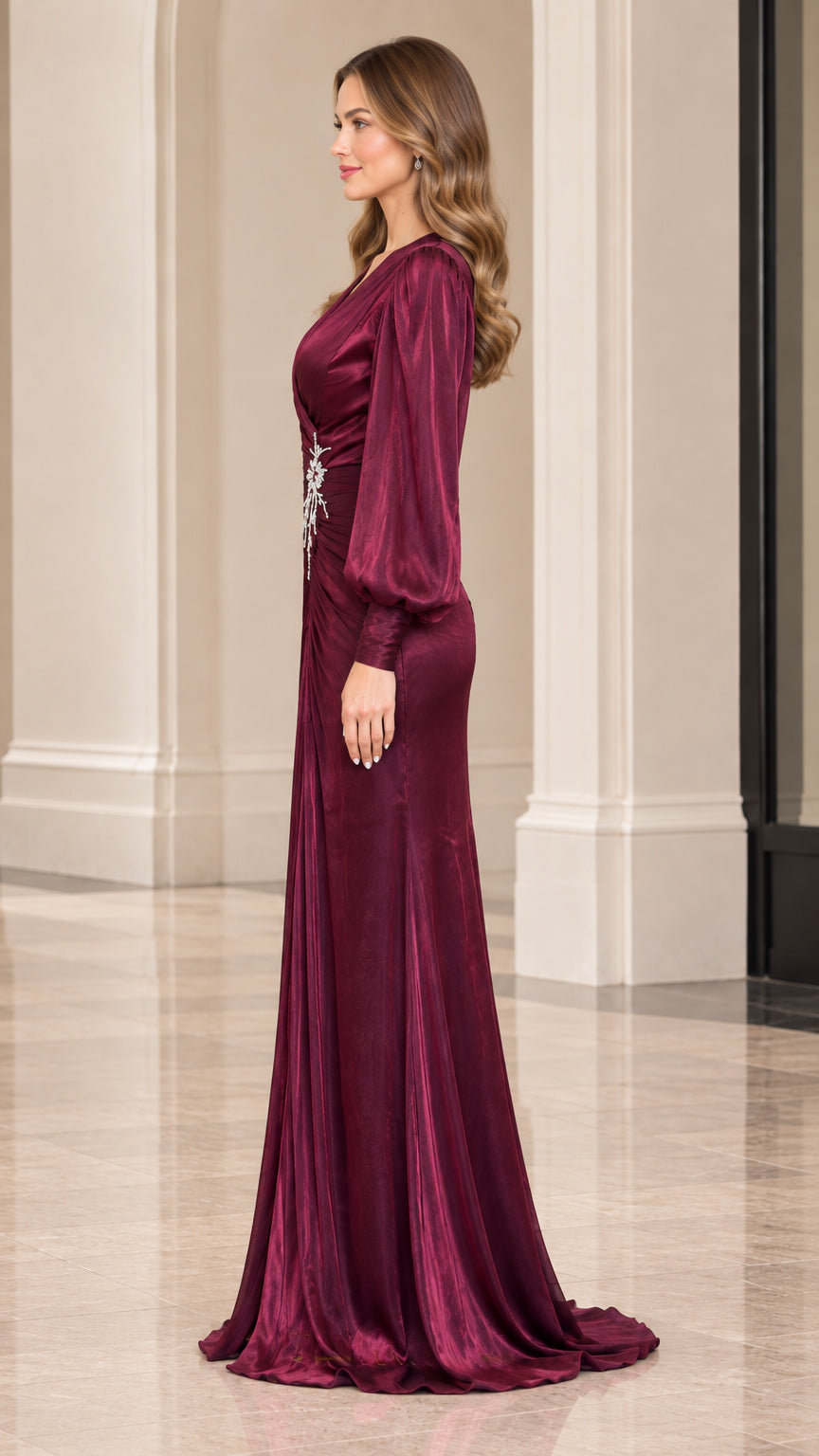Side view of model wearing burgundy long sleeve formal maxi dress