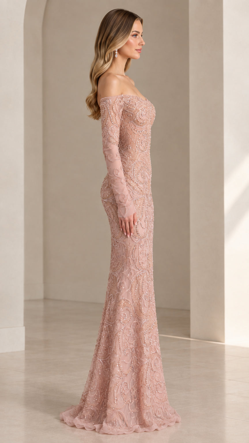 Side profile of woman wearing dusty rose beaded long sleeve formal gown