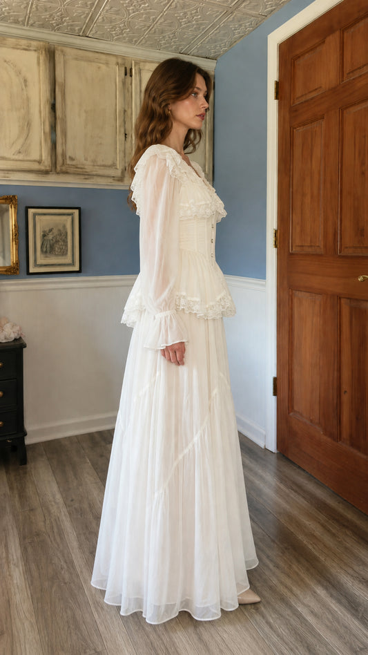 Side profile view of woman wearing white tiered maxi dress