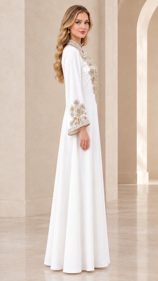 Side profile of elegant white long kaftan dress with metallic embroidered cuffs