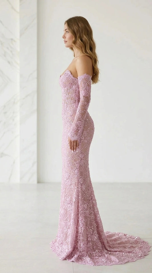 Side profile of pink lace evening gown with train