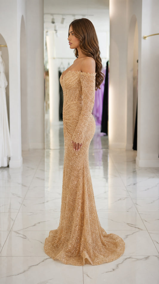 Side profile view of gold evening gown