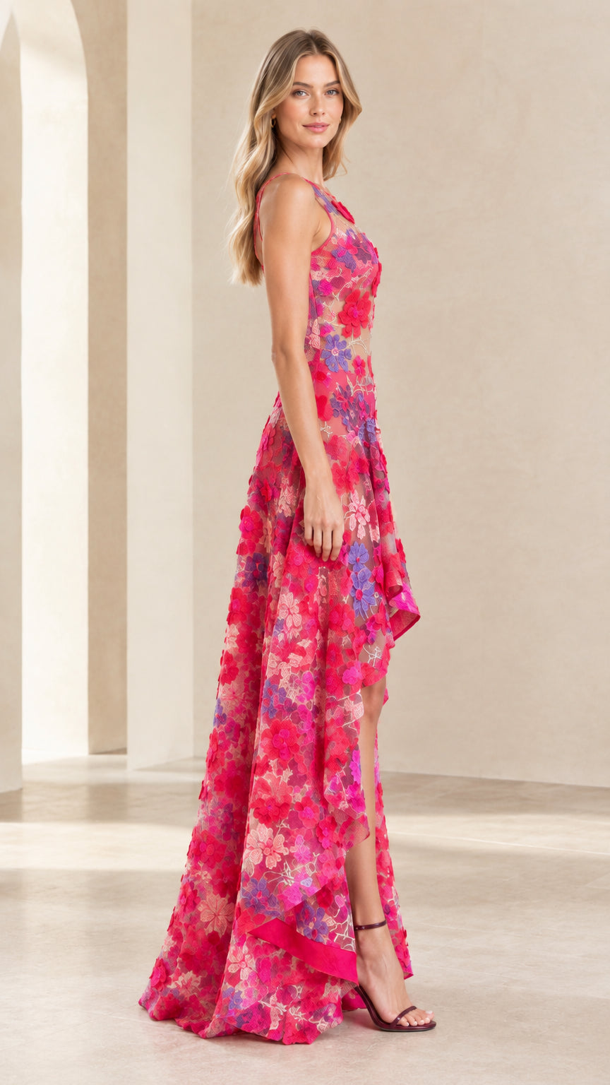 Side view of sleeveless Hot Pink floral lace high-low dress