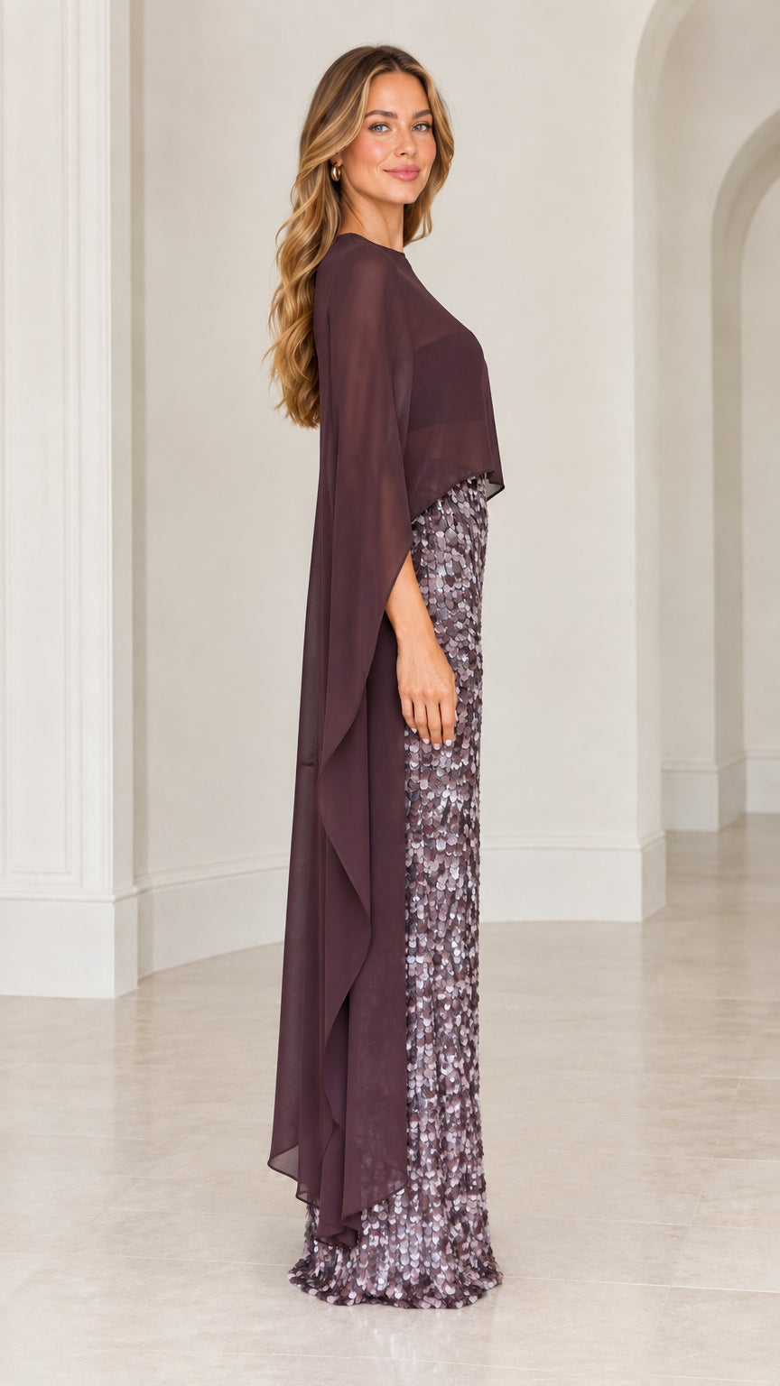 Side profile of plum formal sequin gown with sweeping capelet