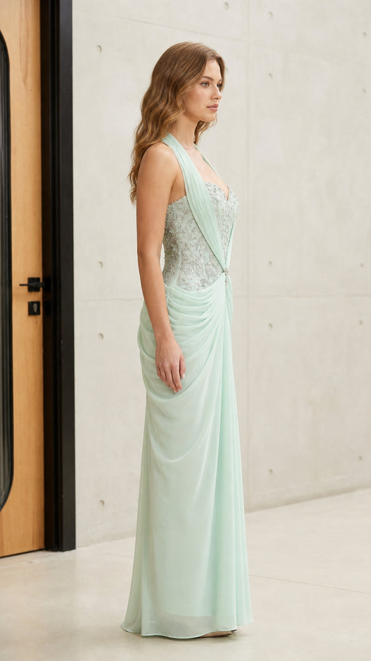 Mint green formal maxi gown with beaded bodice - side profile view