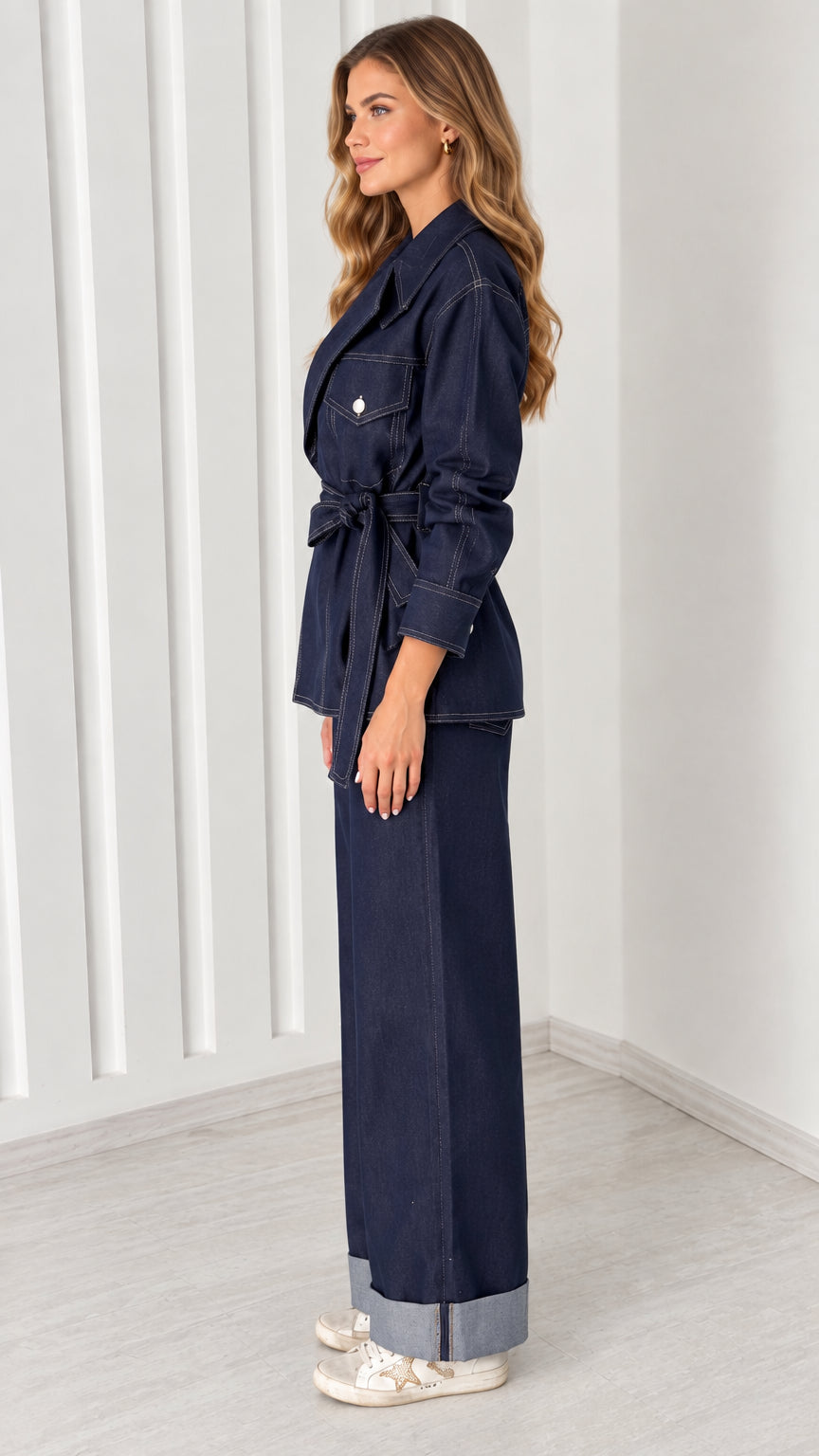 Side profile view of model wearing Dark Indigo two-piece matching utility set