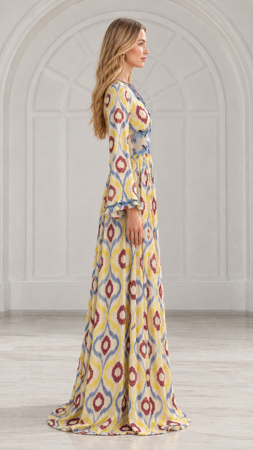 Side profile view of yellow ikat print floor-length maxi dress