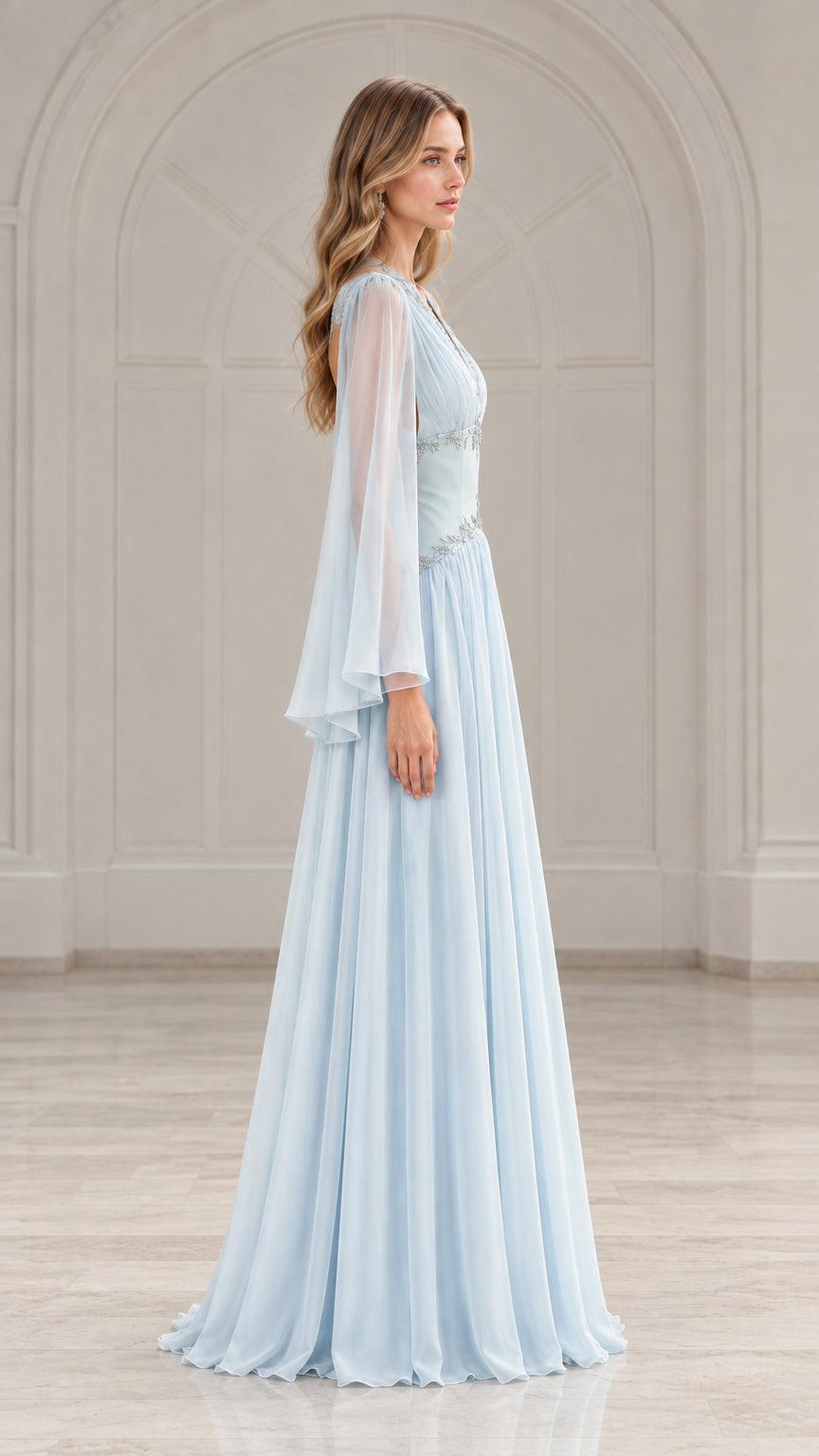 Side profile of model in a floor-length sky blue chiffon gown with flowing split sleeves