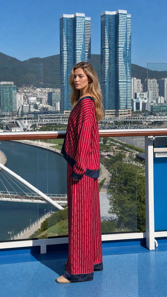 Side view of woman in red striped matching set