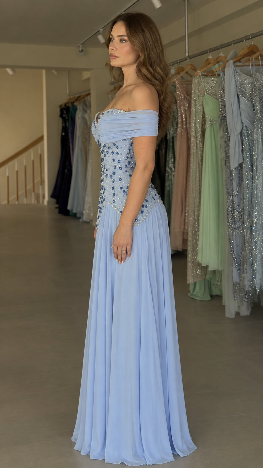 Light blue formal evening dress side view showing pleated chiffon skirt