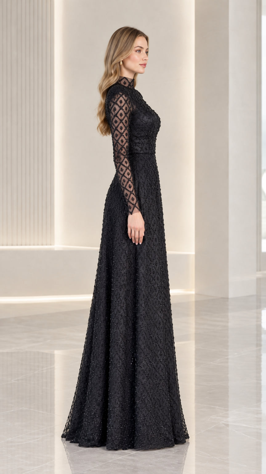 Side 3/4 angle view of model in black long sleeve beaded A-line maxi dress