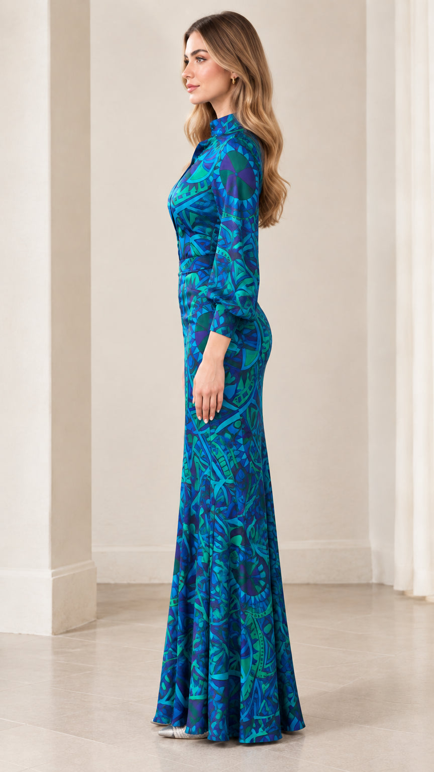 Side profile of royal blue geometric long sleeve evening maxi dress