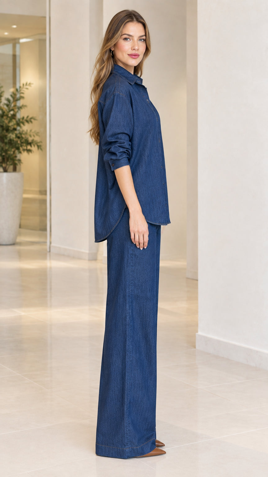 Side view of women's denim blue matching pant set with wide-leg trousers