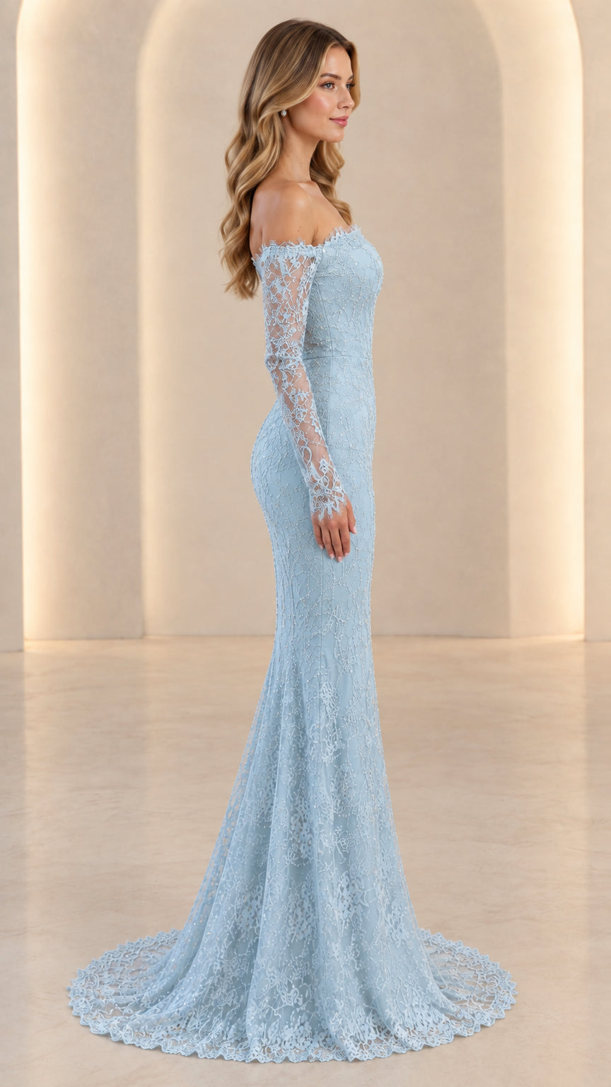 Side profile view of woman modeling light blue lace evening dress with mermaid train