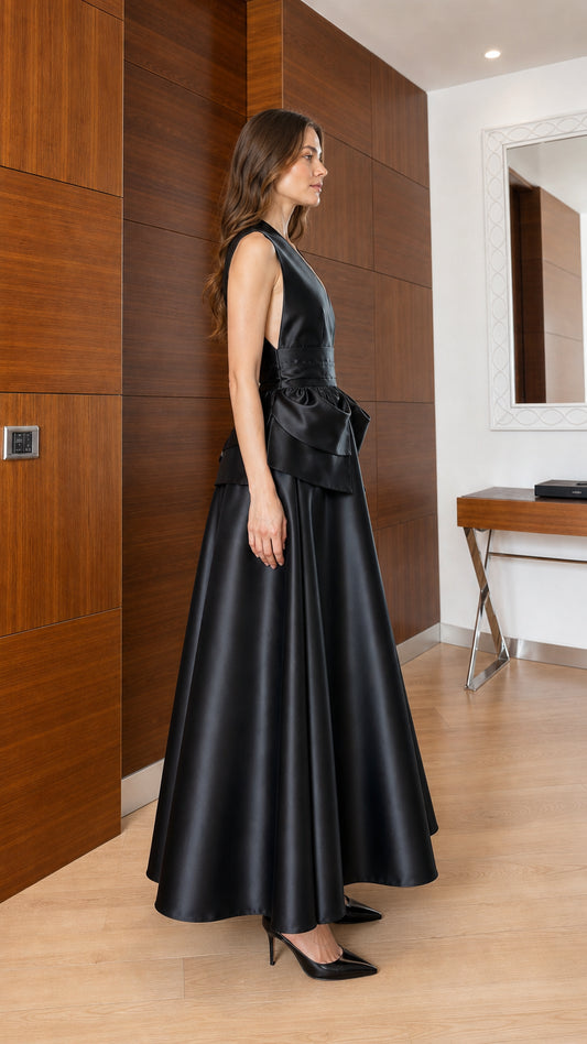 Side profile of black satin maxi dress