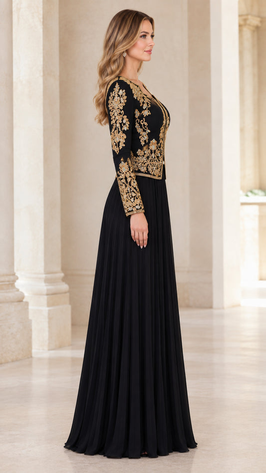 Side profile of black formal gown with gold embroidery and pleated skirt