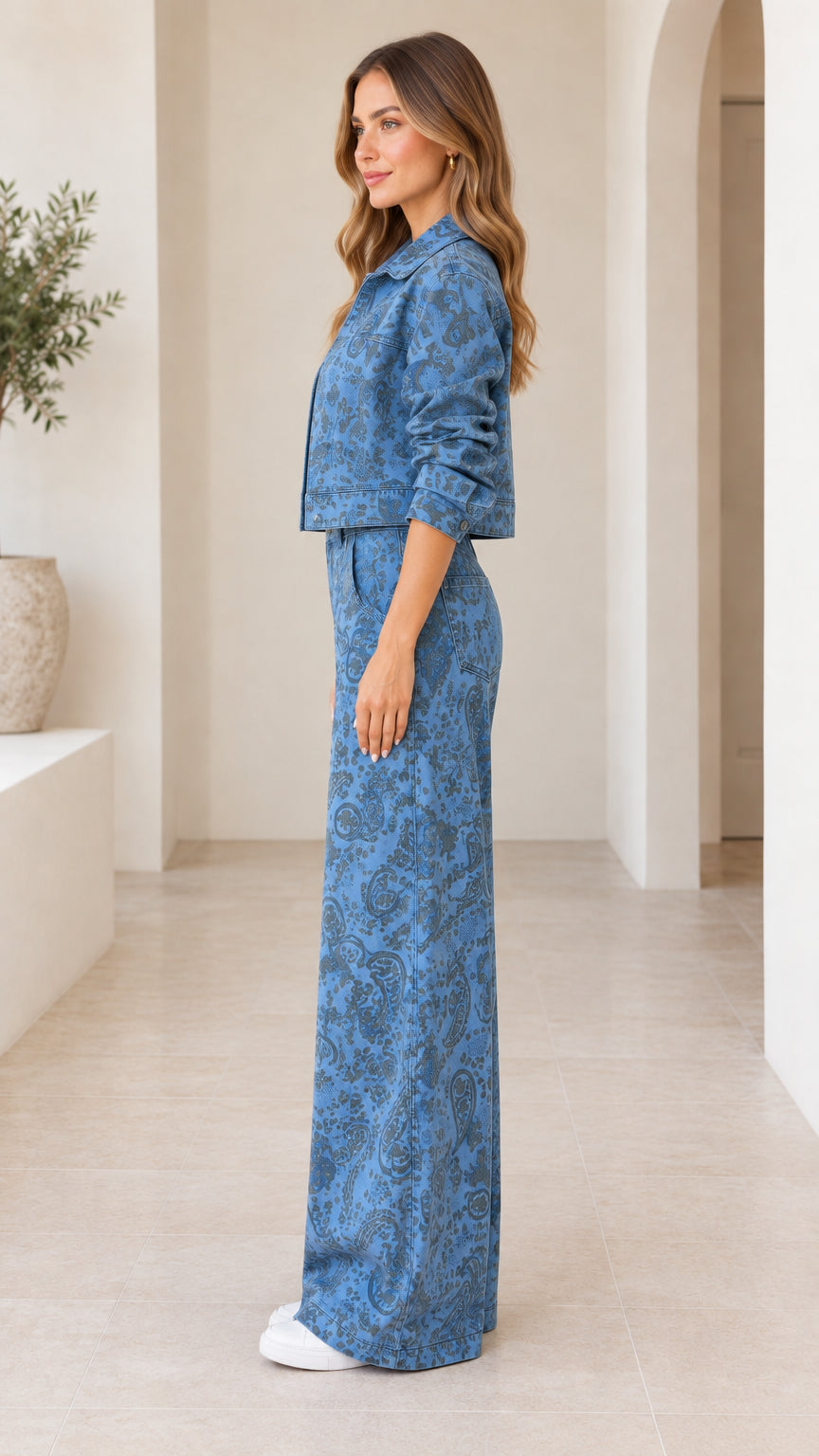 Side view of model wearing Denim Blue paisley print two-piece pant set