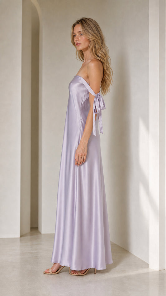 Model in lavender satin maxi dress from side profile